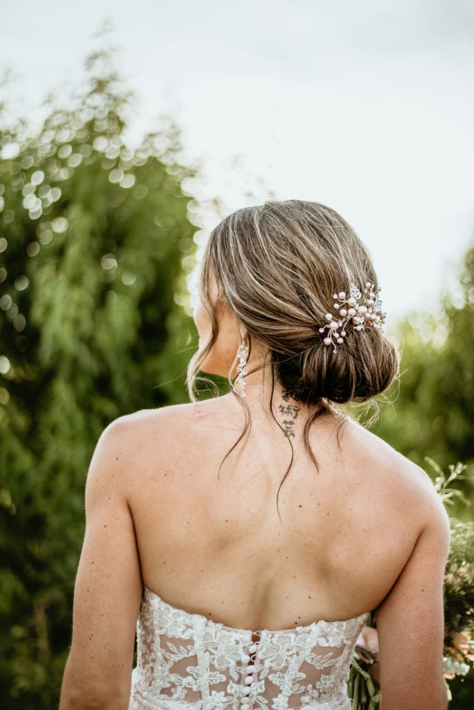 Romantic up do with pearl head piece for Agritopia Farms wedding