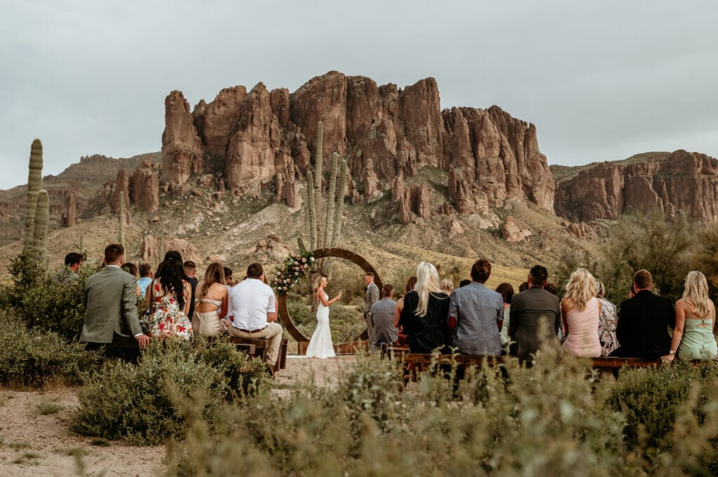Couple says their vows during an intimate ceremony at Lost Dutchman State Park during their Arizona Elopement