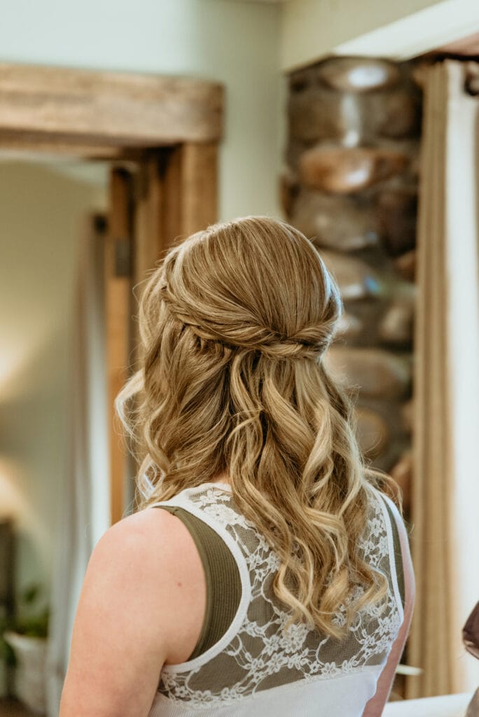 Bridal hair with half up twist and loose curls