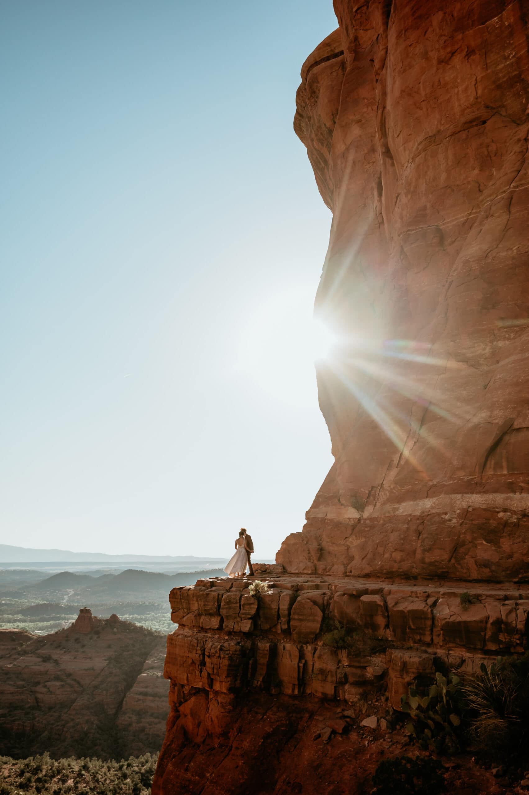 Wedding couple at the main ledge of Cathedral Rock during their elopement wedding pictures