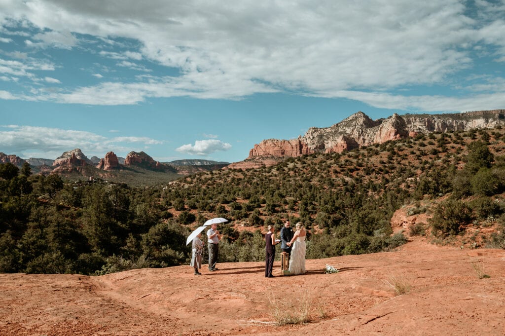 intimate elopement ceremony surrounded by Sedona red rocks