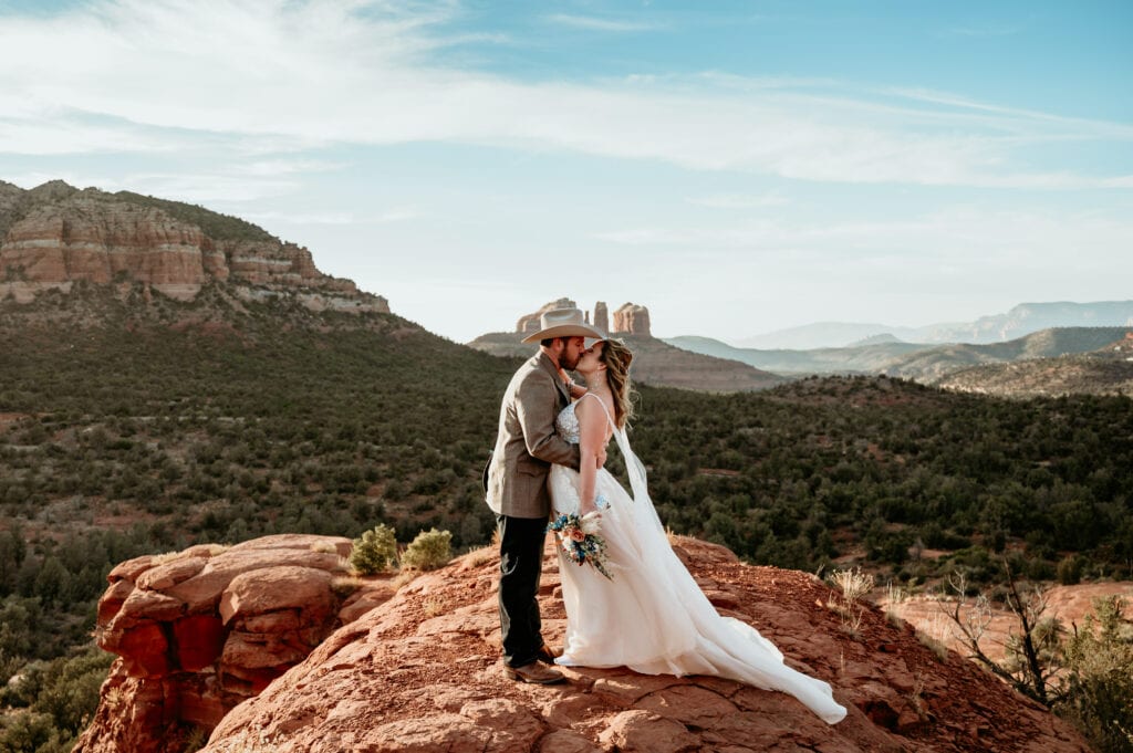 Bride and groom kiss during Arizona elopement