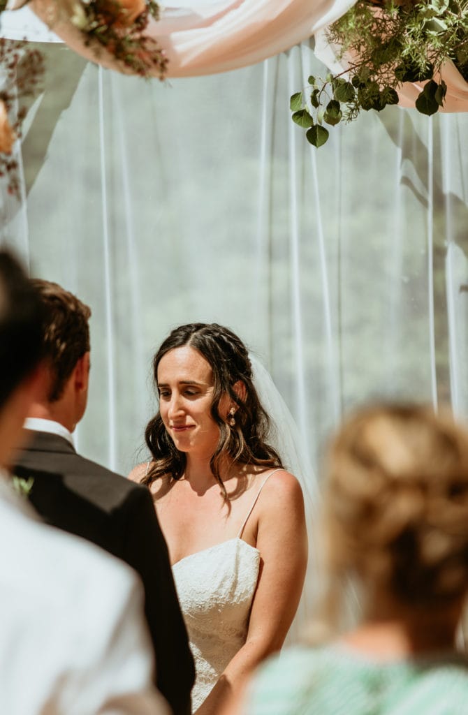 Liz with tears of joy during their Lake San Cristobal wedding