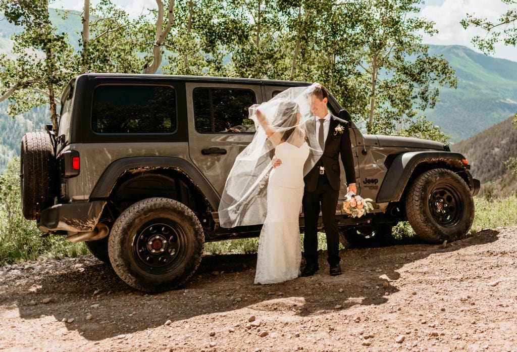 Mountain elopement with a jeep off road trail ride for epic couple's portraits