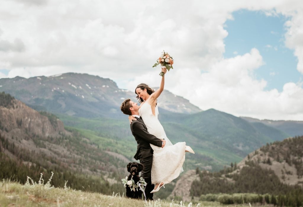 Couple celebrating their elopement with their dog in Lake City, Colorado