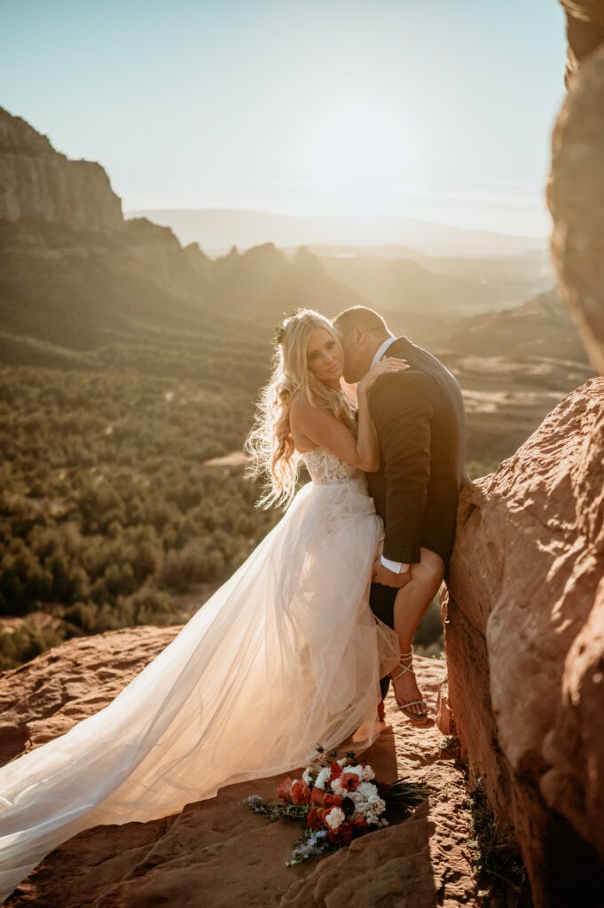 Bride and groom embrace during their Sedona offroad wedding