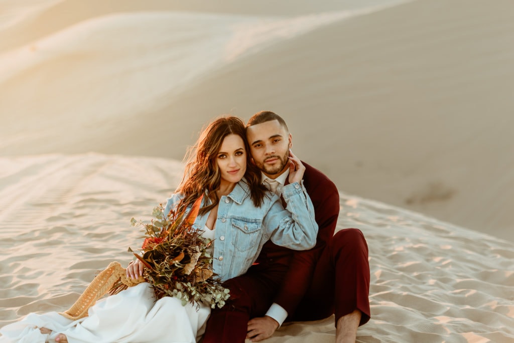 Deep stare as the setting sun highlights couple during their Glamis elopement